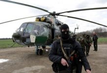 Explozii, fum și armament greu utilizat în estul Ucrainei. „Vor să înceapă AL III-LEA RĂZBOI MONDIAL”, spune premierul ucrainian Foto: EPA