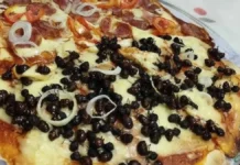 O nouă „senzație” culinară în Brazilia: Pizza cu furnici uriașe tanajura – VIDEO