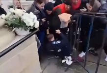 VIDEO Scandal la pelerinajul de la Iași! Doi bărbați au fost încătușați de jandarmi, după ce au forțat intrarea în Catedrală
